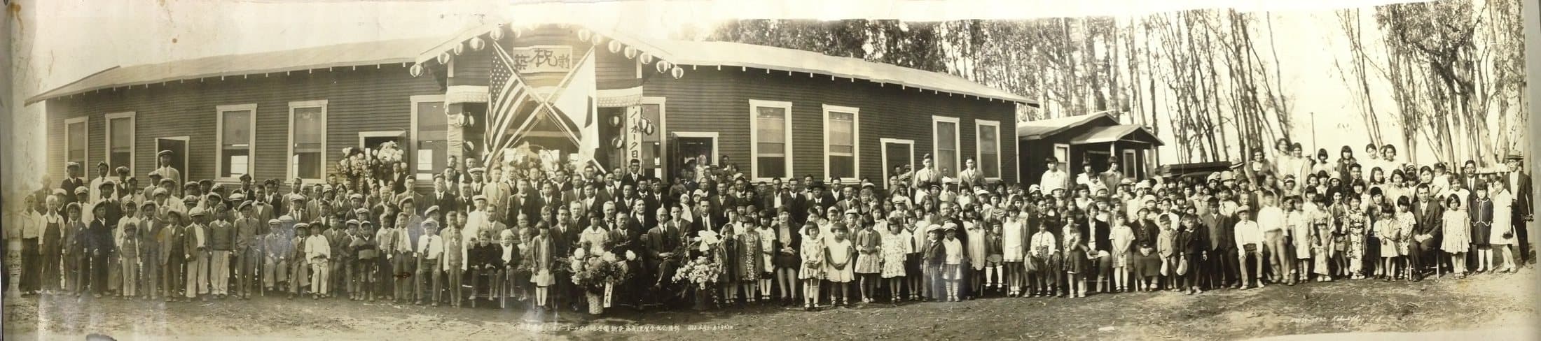 The community gathered outside the new Norwalk Gakuen school building at its 1930 dedication