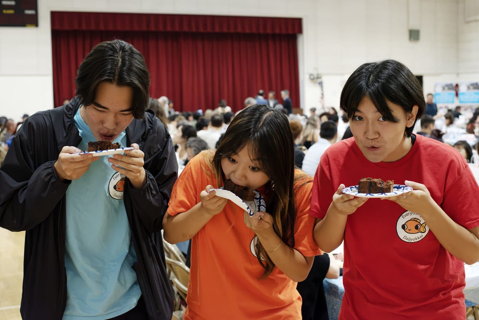 Three young guests tasting dessert
