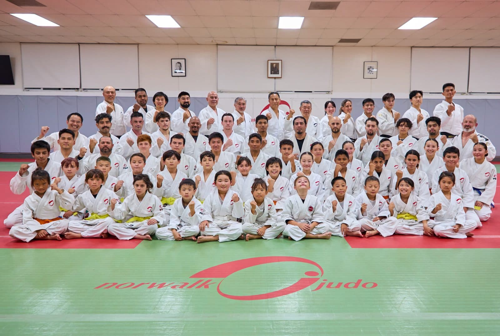 Norwalk Judo students and instructors gathered on the dojo mats