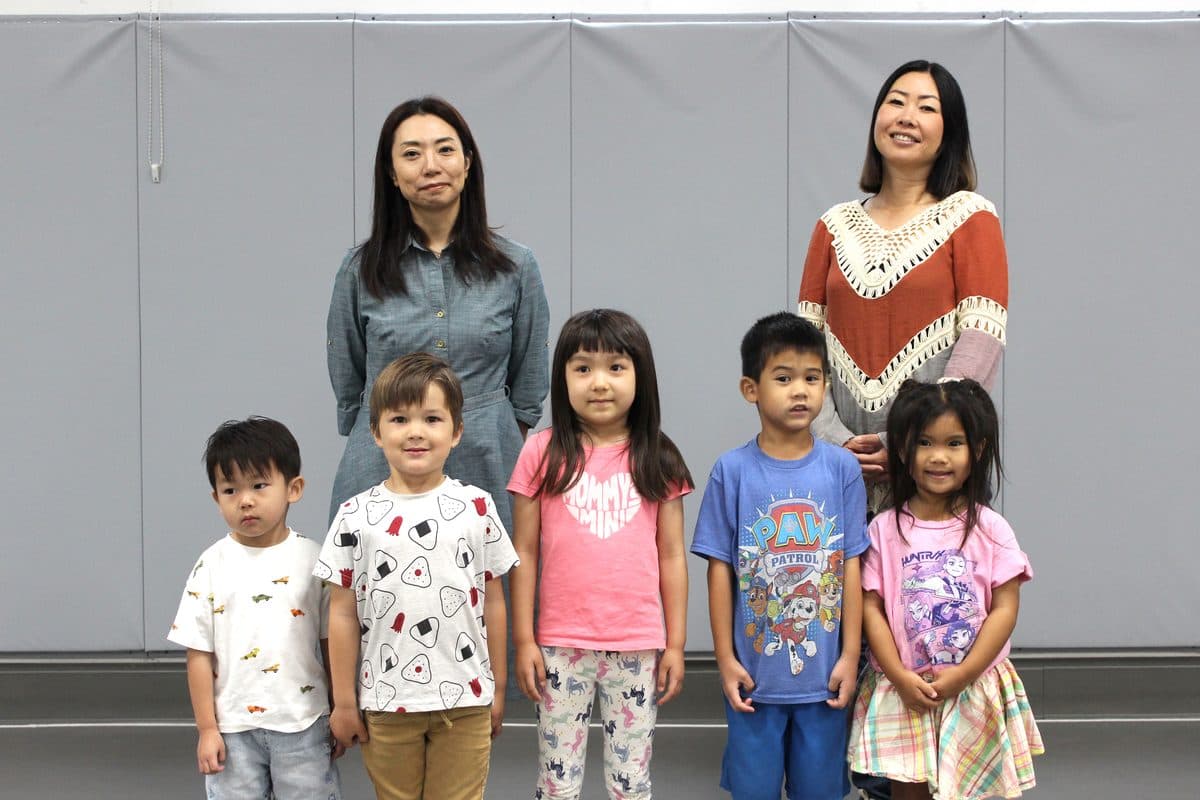 Kindergarten students with their teachers