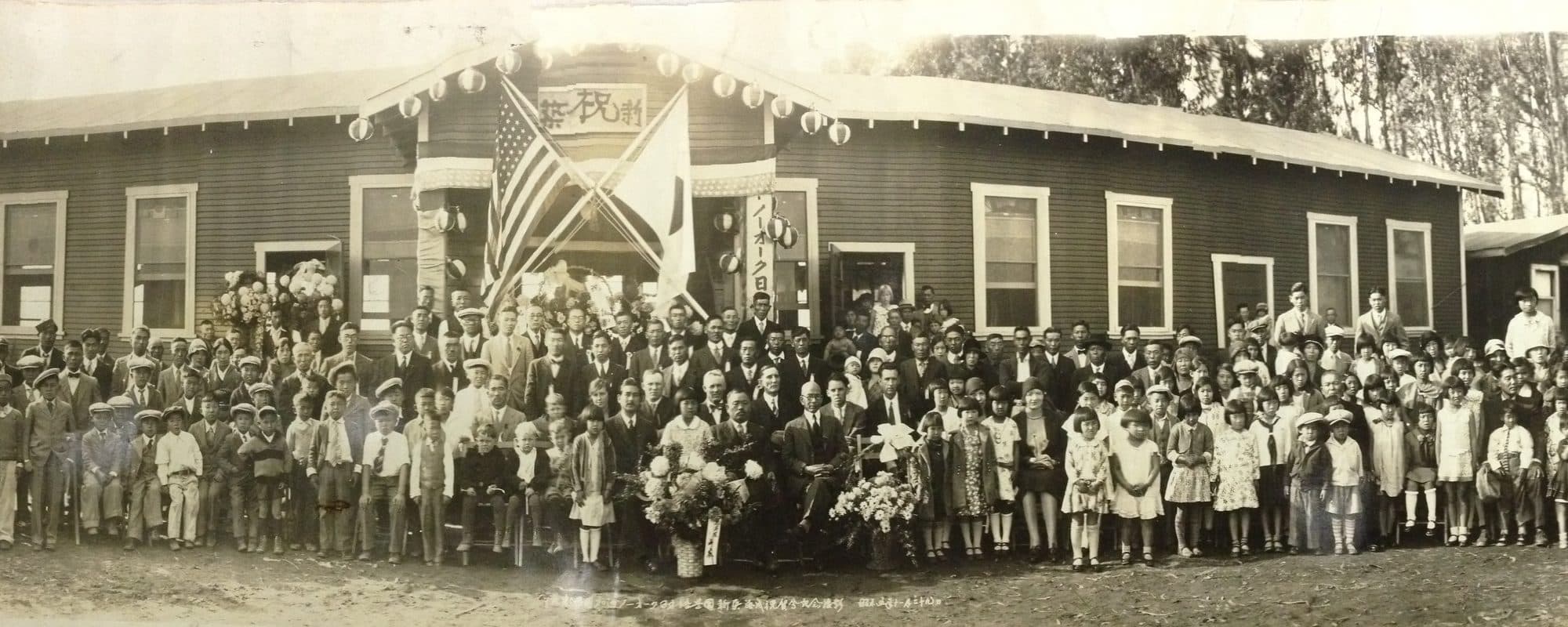 The community gathered outside the original wooden Norwalk Gakuen schoolhouse in 1930